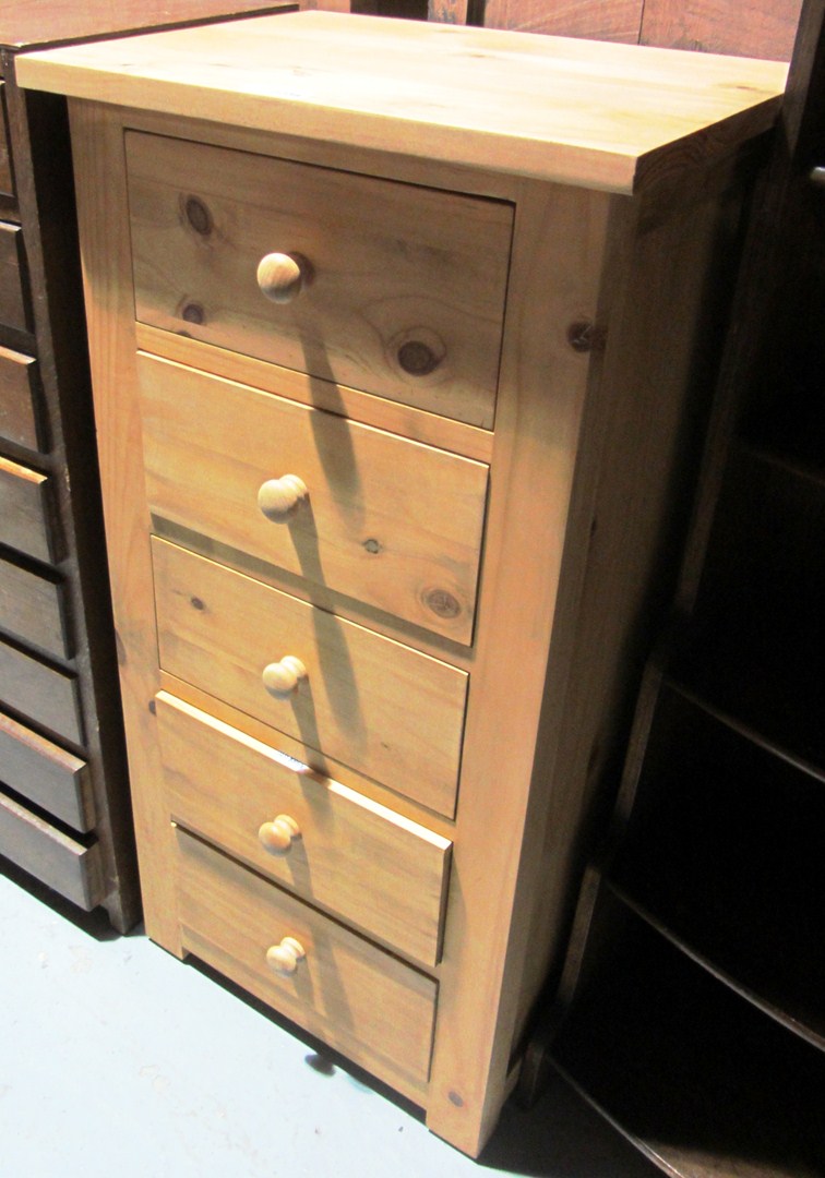 Appraisal: A tall narrow chest of five drawers