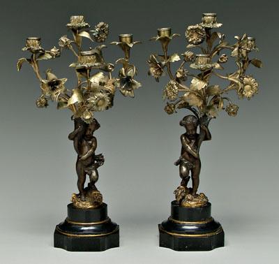 Appraisal: Pair bronze candelabra each with four cups amid flowers and