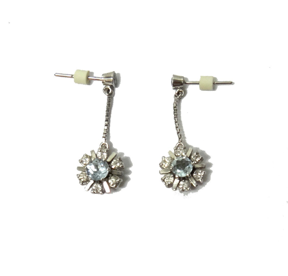 Appraisal: A pair of aquamarine and diamond set pendant cluster earrings