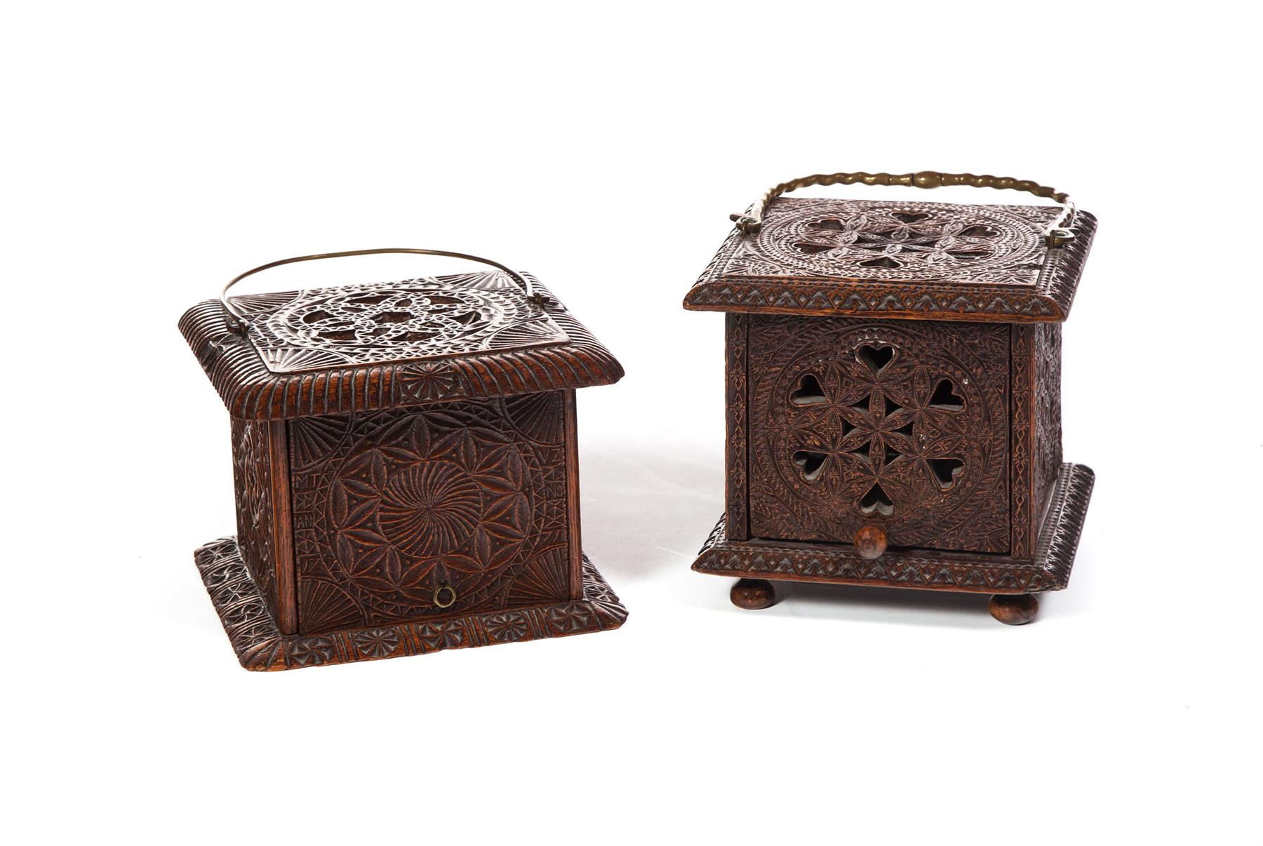 Appraisal: TWO CONTINENTAL FRIESIAN CARVED FOOT WARMERS Eighteenth- th century Heavily