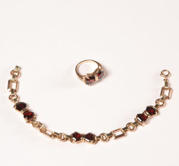 Appraisal: Gold K garnet and tone link bracelet and ring set