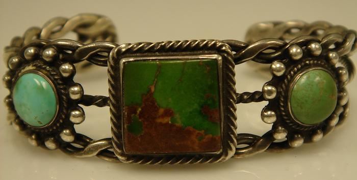 Appraisal: Silver Cuff Bracelet Unmarked decorated with turquoise cabochons one square