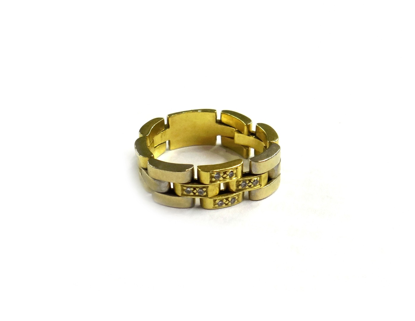 Appraisal: A two colour gold and diamond set ring in a