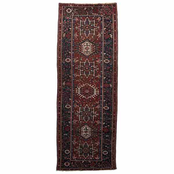 Appraisal: Karaja Rug Iranian a wool Karaja runner with a medallion