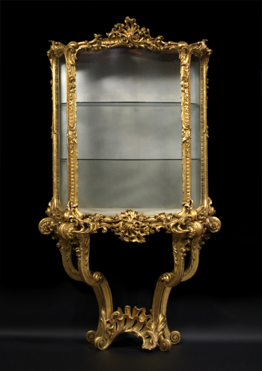 Appraisal: Exuberantly Modeled Louis XV-Style Giltwood Vitrine ca with a deeply