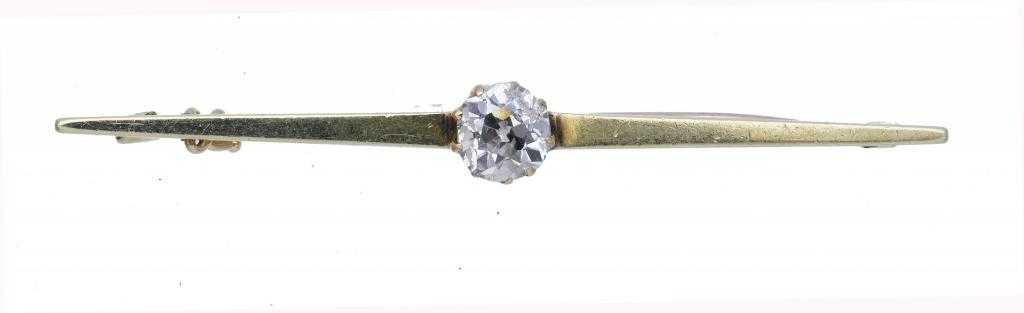 Appraisal: A DIAMOND BAR BROOCH with a central old cut round