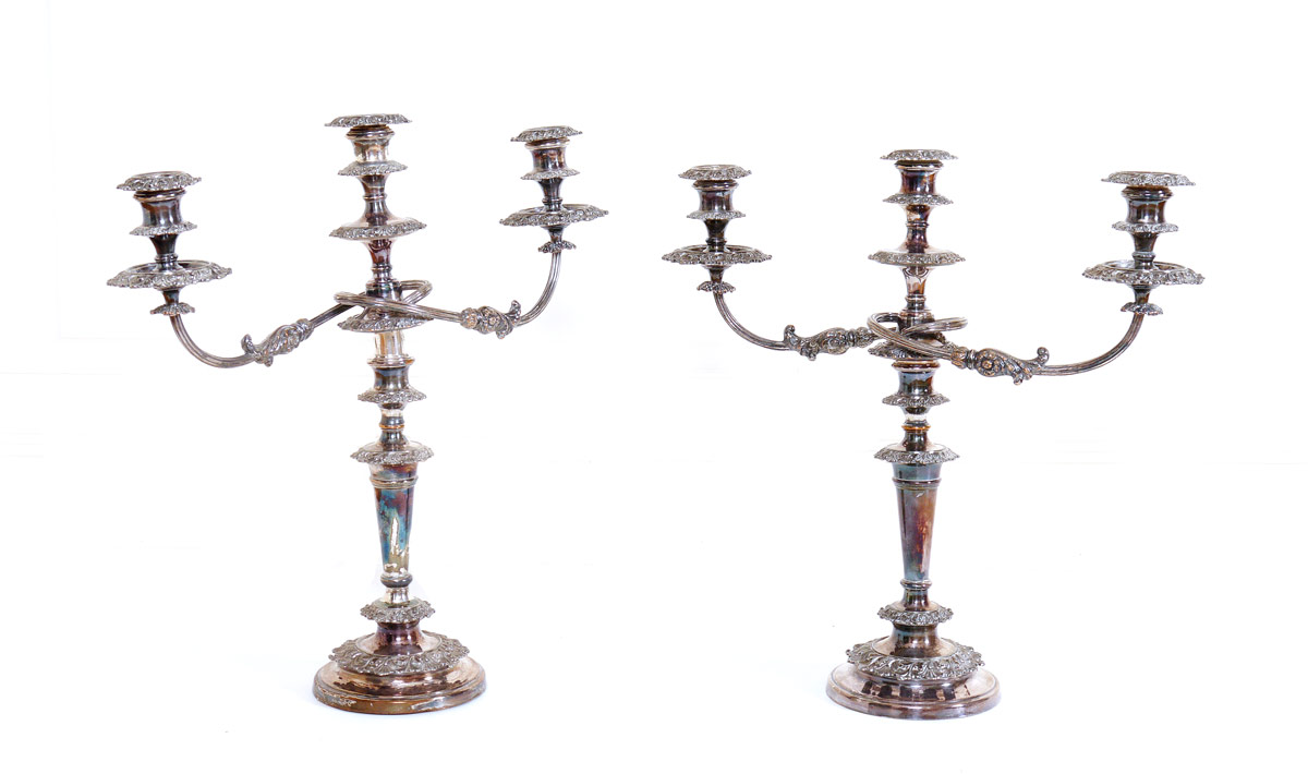 Appraisal: PAIR SHEFFIELD SILVERPLATE CANDELABRA Triple light convertible to single light