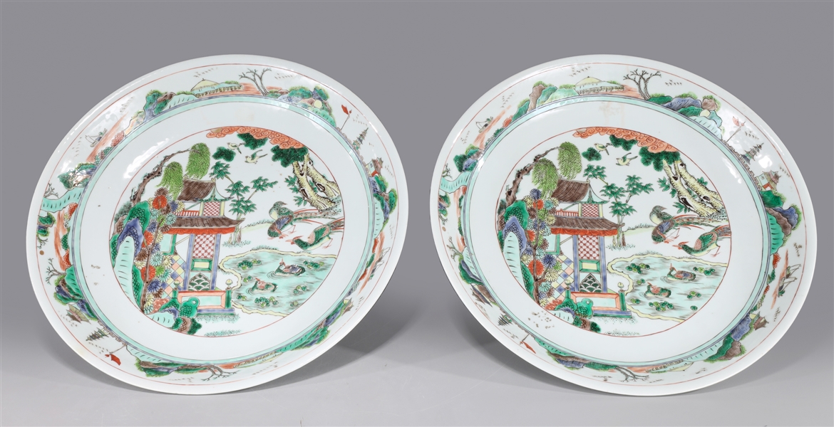 Appraisal: Pair of Chinese famille verte enameled porcelain chargers each with