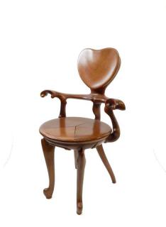 Appraisal: Antoni Gaudi Calvet chair carved oak Originally designed by Gaudi