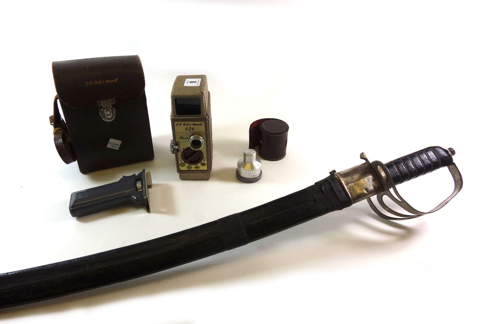 Appraisal: A G B Bell Howell hand held clockwork driven cine