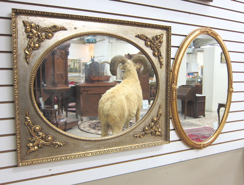 Appraisal: TWO MIRRORS IN GILT WOOD FRAMES One oval measuring x