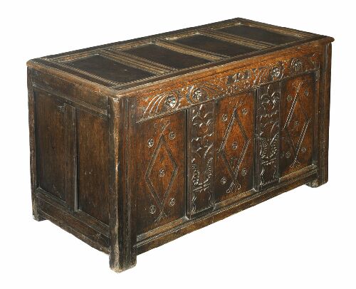 Appraisal: An early th century oak blanket chest the four panelled