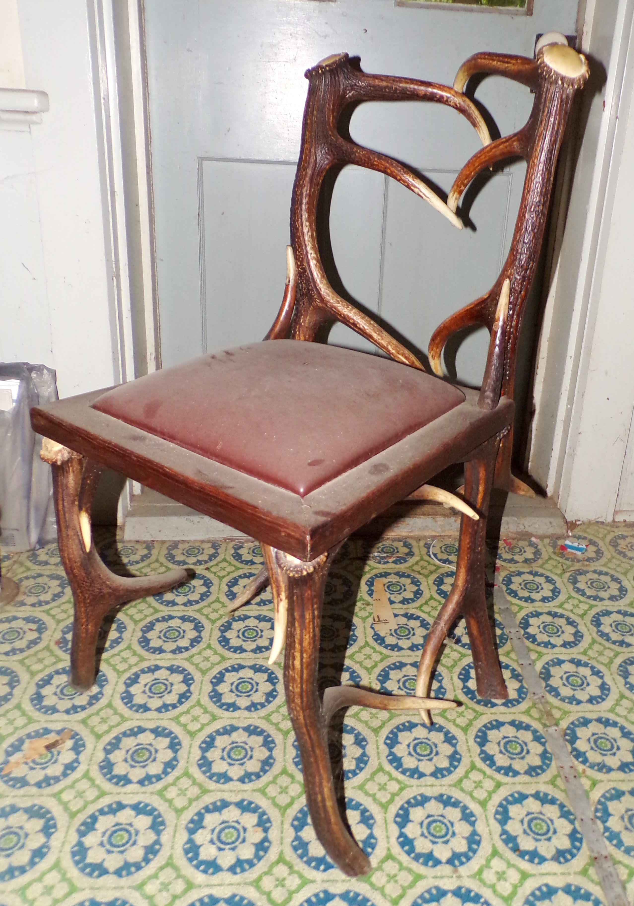 Appraisal: Vintage elk antler chair oak upholstered seat ''h