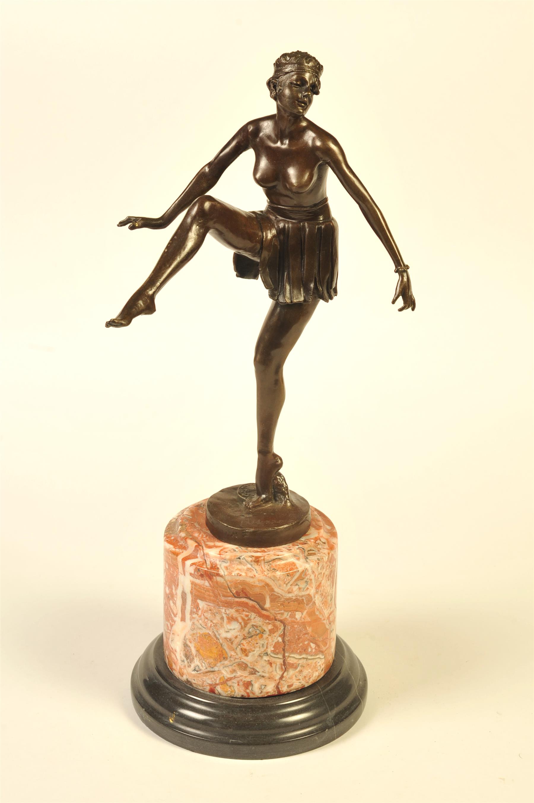 Appraisal: BRONZE OF A DANCING FLAPPER ON A ROUND PINK MARBLE