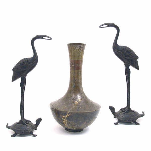 Appraisal: A group of Asian bronzes including a Japanese vase with