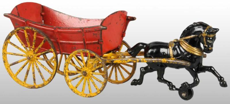 Appraisal: Cast Iron Tin Hubley Farm Wagon Toy Description Pulled by