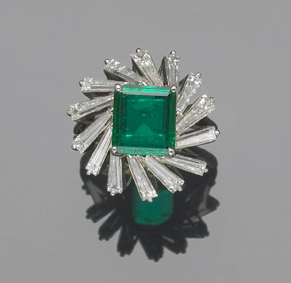 Appraisal: An emerald diamond and platinum ring emerald weighing an estimated