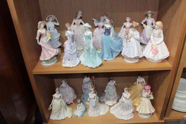 Appraisal: A COLLECTION OF ROYAL WORCESTER PORCELAIN FIGURINES to include ladies