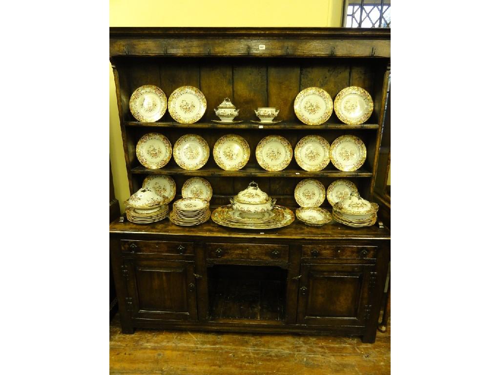 Appraisal: A Georgian figured and burr oak dresser the raised open