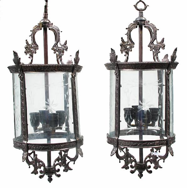 Appraisal: A pair of English bronze hall lanterns with etched glass