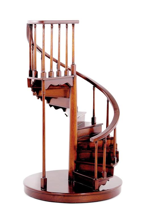 Appraisal: Mahogany curio stand in the form of spiral staircase H