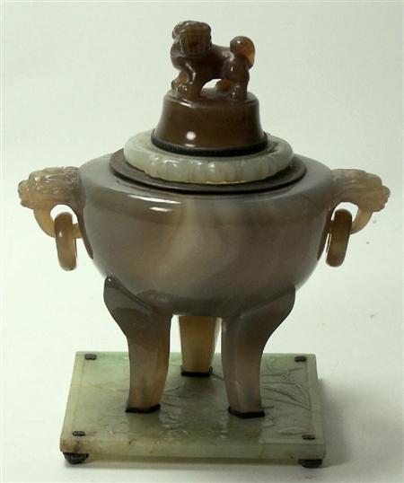 Appraisal: A Japanese agate jade and silver mounted inkwell the hinged