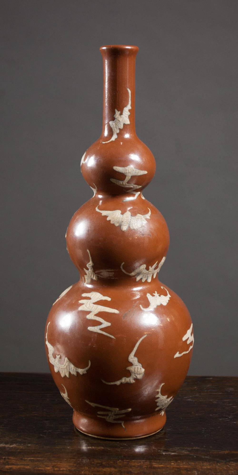 Appraisal: CHINESE PORCELAIN VASE triple gourd form with white relief bats