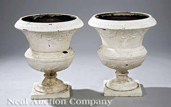 Appraisal: A Pair of American Victorian Cast Iron Urns floral and