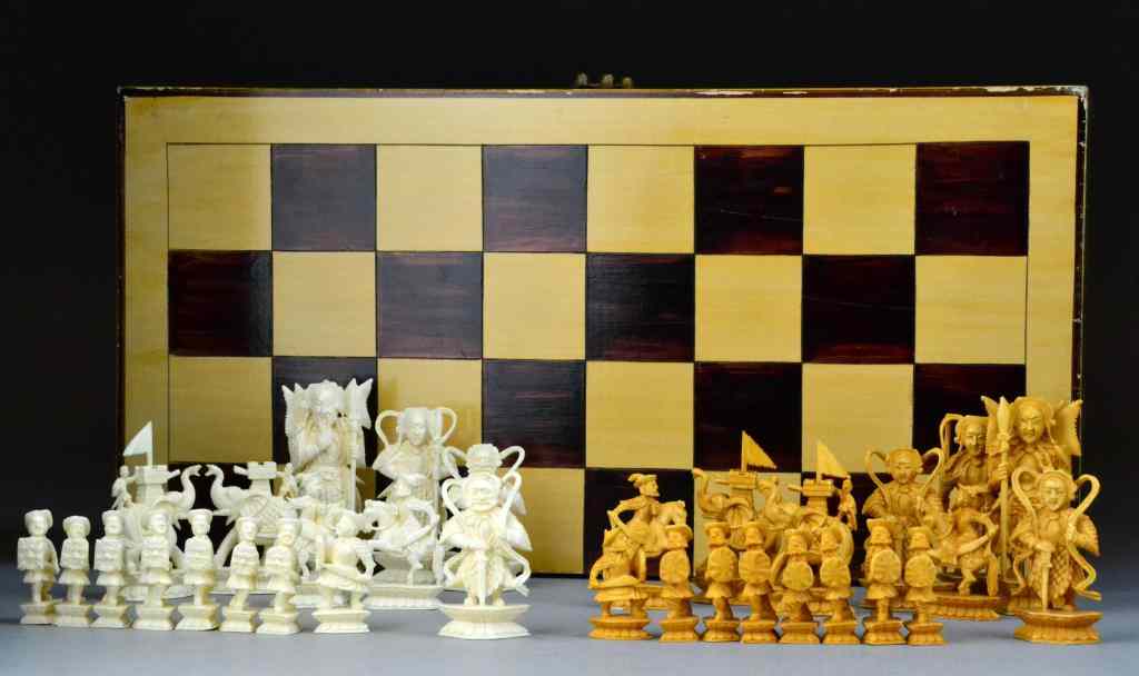 Appraisal: Pcs Chinese Carved Ivory Chess SetTo include sixteen pieces in