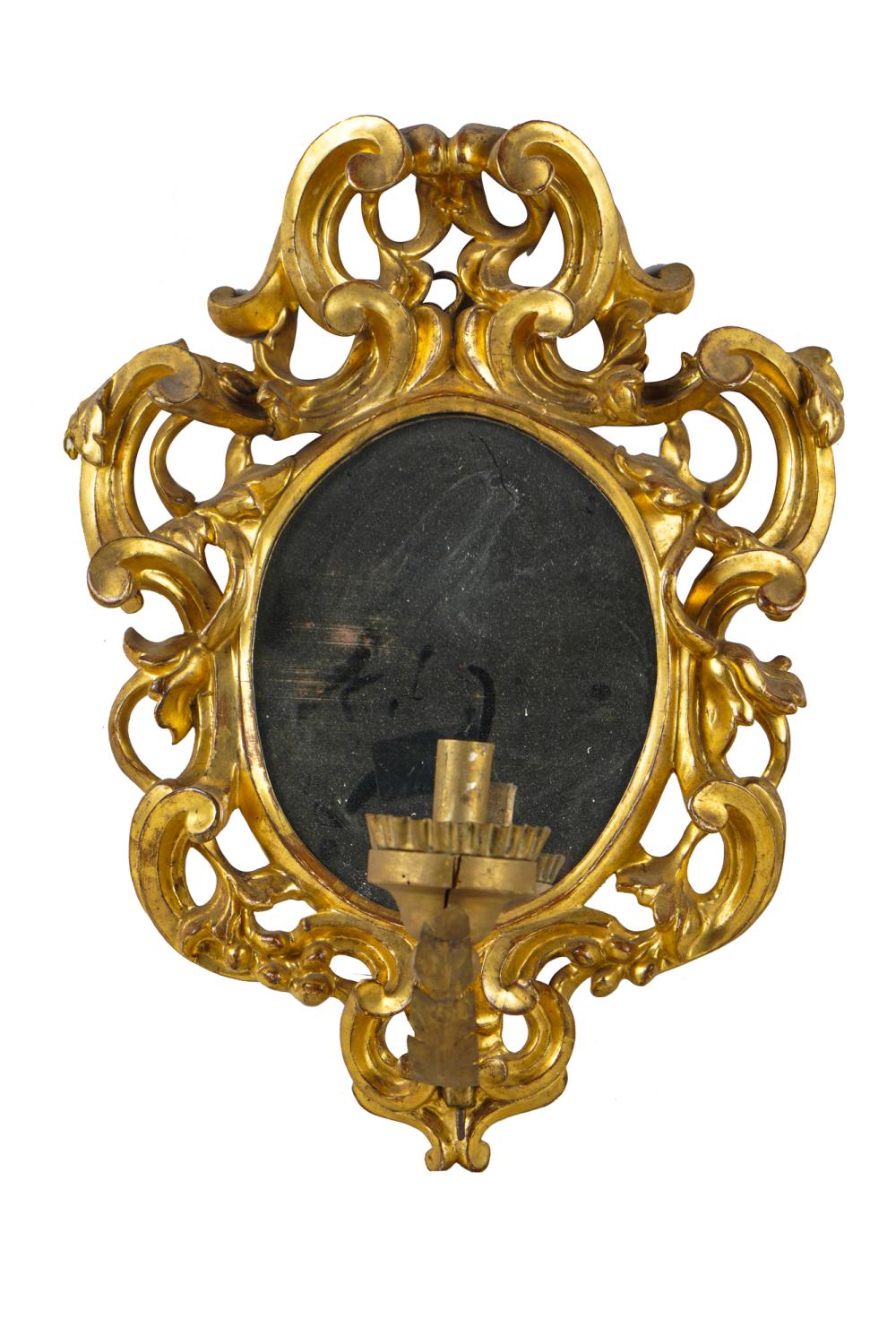 Appraisal: CARVED GILT-WOOD MIRROR-BACK SCONCEwith a gilt metal candle arm and