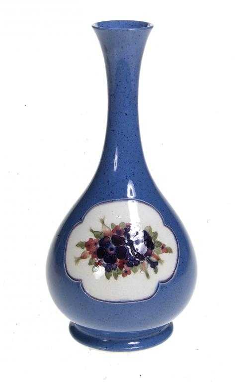 Appraisal: A MOORCROFT POWDER BLUE GROUND VASE DESIGNED BY WILLIAM MOORCROFT