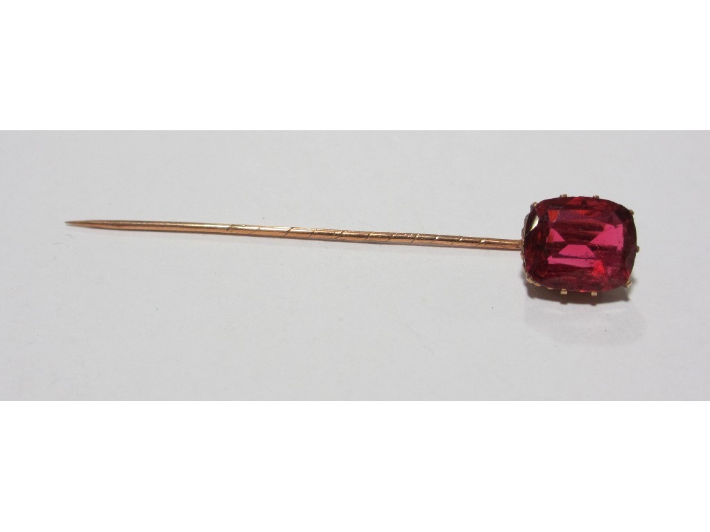 Appraisal: Rose gold stick pin with gem set top