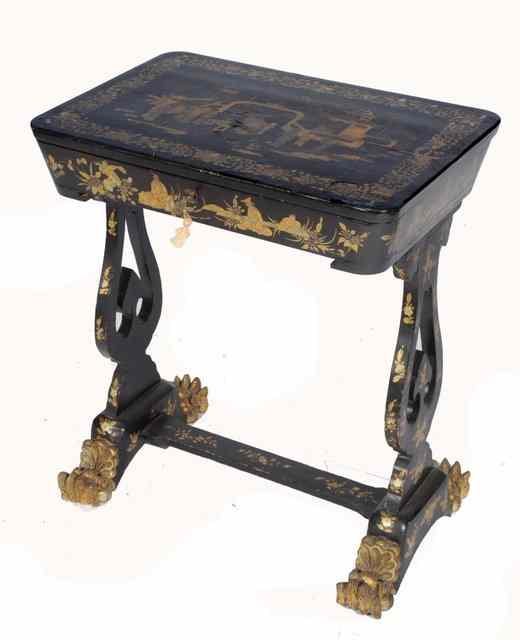 Appraisal: A CHINESE EXPORT GAMES TABLE with fitted interior the cover