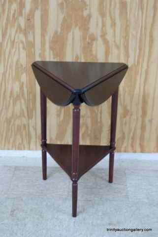 Appraisal: Mahogany Triple Drop Leaf Side TableFrom an estate is a