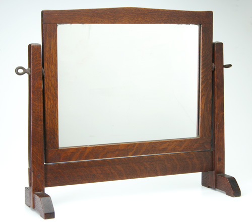 Appraisal: GUSTAV STICKLEY Shaving mirror with shoe-feet and V-top Fine original