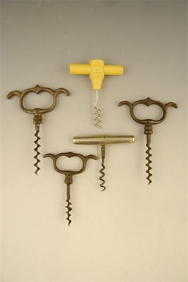 Appraisal: Three iron cellarman corkscrews a roundlet with a grooved wire