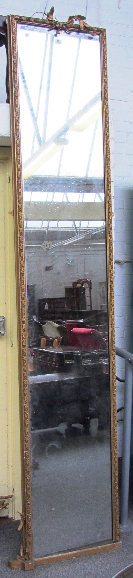 Appraisal: A tall th century rectangular robing mirror in a moulded