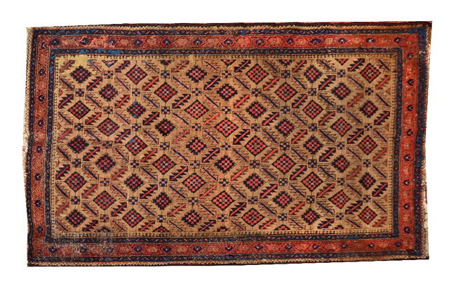 Appraisal: A BELOUCH CAMEL GROUND RUG with a continuing design of