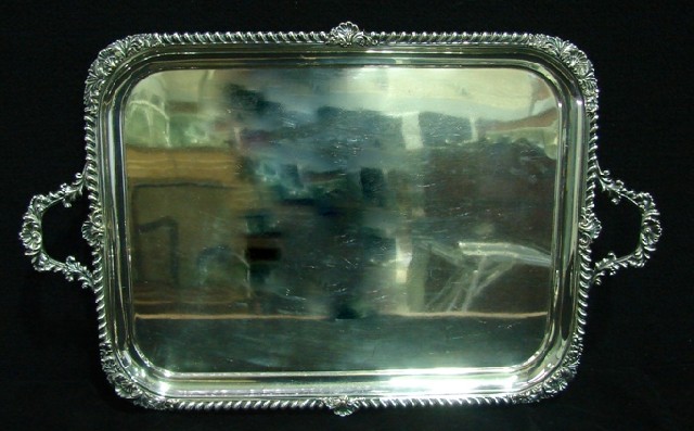 Appraisal: A large Maple Co silver plate tray with gadrooned scroll