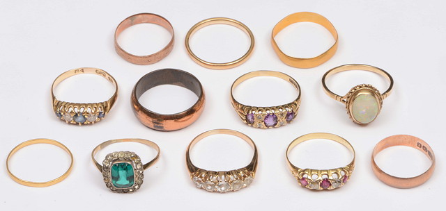 Appraisal: TWELVE RINGS to include a ct gold opal set ring