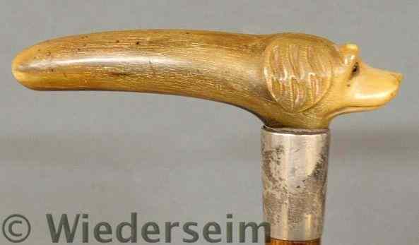 Appraisal: Carved bone walking stick late th c with a carved