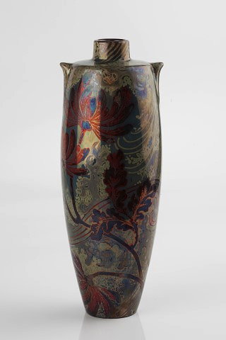 Appraisal: Keller Guerin LunevilleVase circa decorated with flowering foliage and lustre