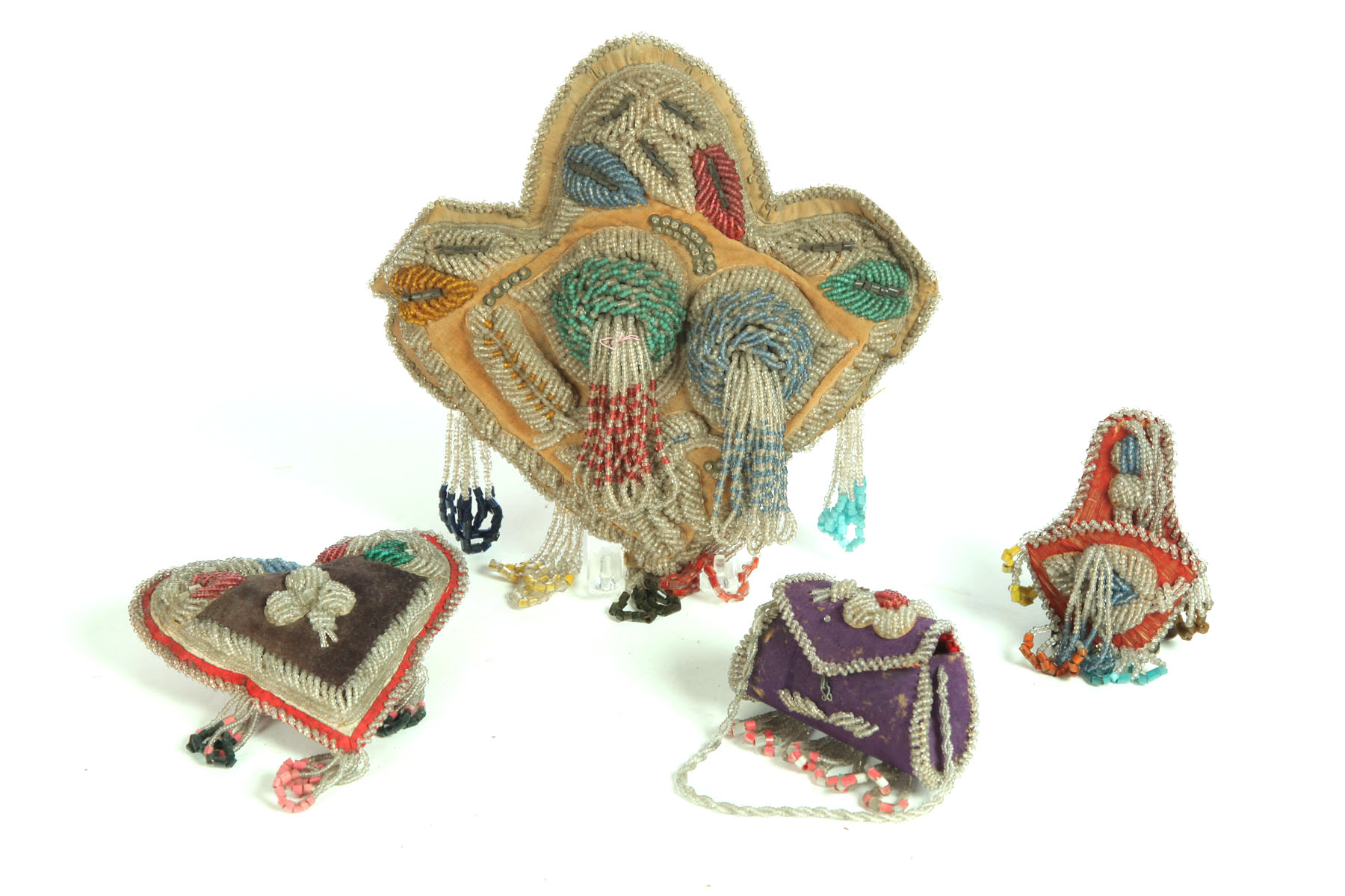 Appraisal: FOUR INDIAN BEADED ITEMS Iroquois th century Beadwork on velvet