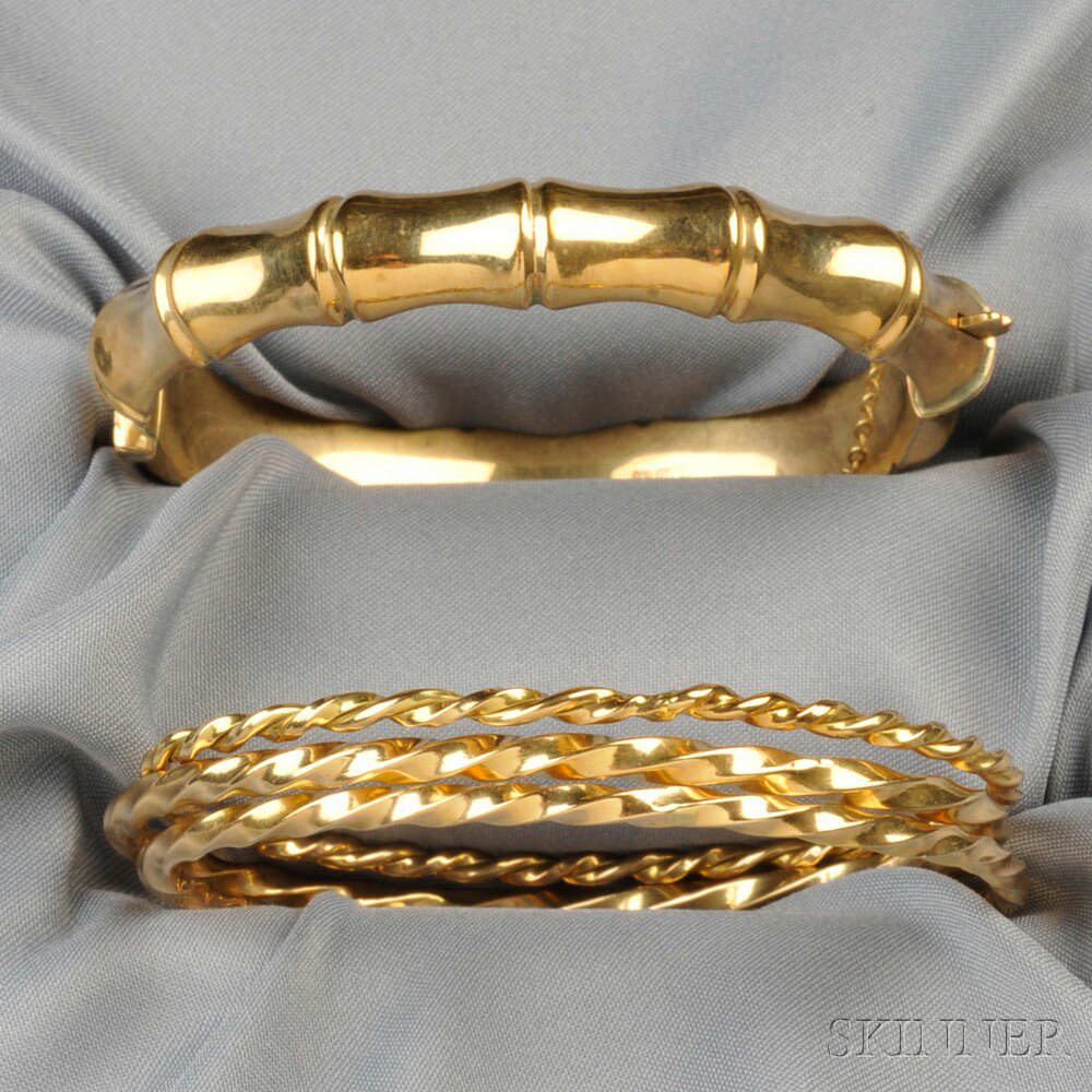 Appraisal: Four Gold Bracelets a kt gold hinged bamboo-motif bangle and