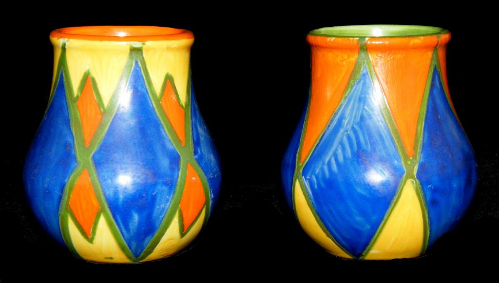 Appraisal: Two similar 'Original Bizarre' Newport Pottery' ovoid vases each painted