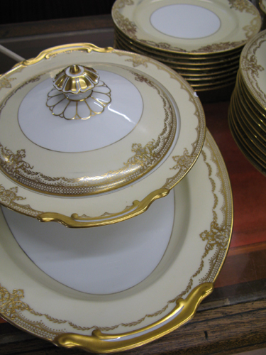 Appraisal: A NORITAKE FINE CHINA SET pieces hand painted with gold