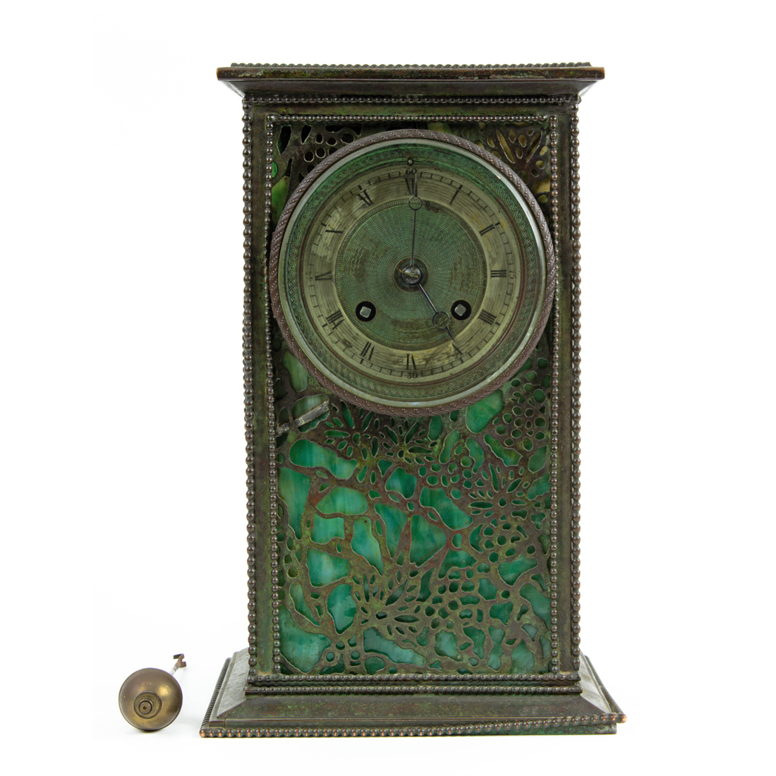 Appraisal: A RIVIERE PATINATED METAL AND SLAG GLASS TABLE CLOCK IN