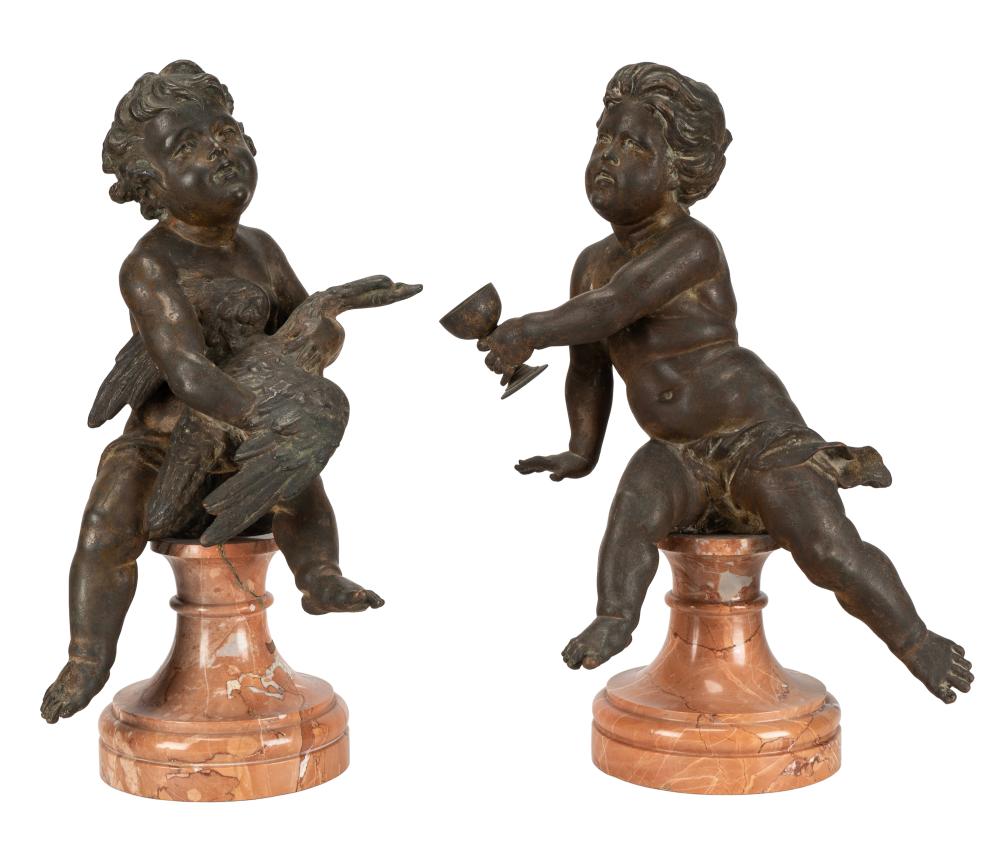 Appraisal: PAIR OF BRONZE MARBLE CHERUB FIGURESunsigned one depicted holding a