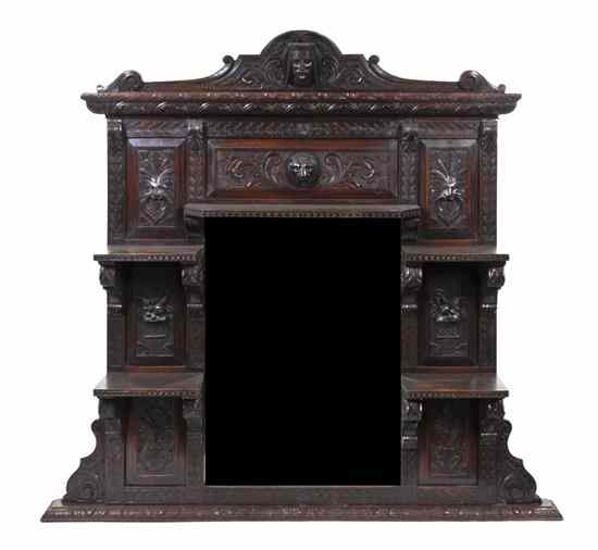 Appraisal: A Renaissance Revival Carved Oak Over Mantel Mirror the peaked