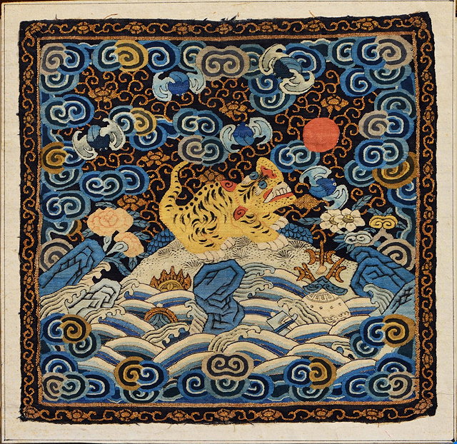 Appraisal: A CHINESE SILK WORK SQUARE PANEL decorated a central snarling